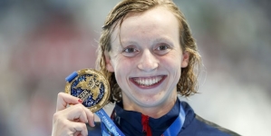 Katie Ledecky sets another world record, makes history with 800 free win