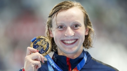 Katie Ledecky sets another world record, makes history with 800 free win