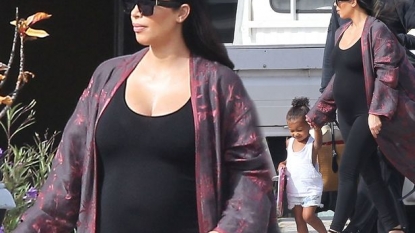 Pregnant Kim Kardashian slips into skintight unitard as she’s joined by