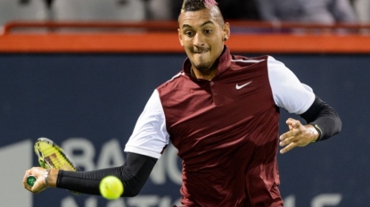 Kyrgios fined, apologizes for comment to Wawrinka