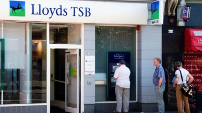 Lloyds profits rise despite compo costs