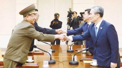 North, South Korean officials meet at the border to ease tension