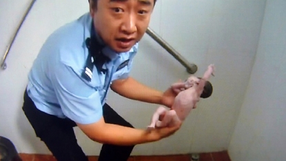 Chinese police save infant girl from pipe of public toilet