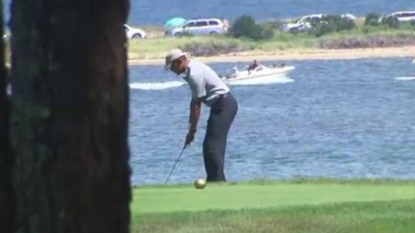 Obama back on the golf course