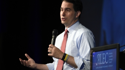 Walker leaves for debate without answering questions