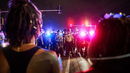 4th night of Ferguson protests brings confrontation, arrests