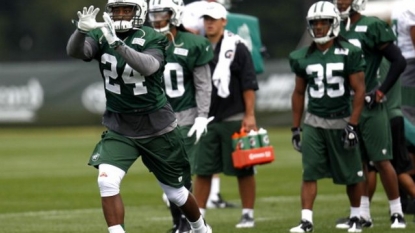 Muhammad Wilkerson will report to Jets camp despite contract squabble