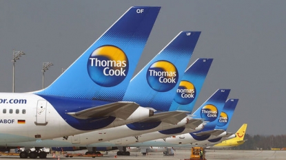 Thomas Cook profits hit by Tunisia attack and Greece woes