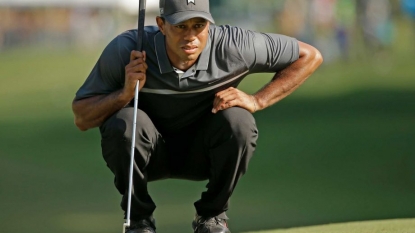 Tiger Woods tied for lead at Wyndham Championship