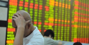 Chinese shares trade lower again after days of volatility