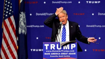 Donald Trump asks woman to touch his hair