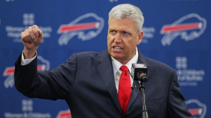 Watch Rex Ryan, Terry Pegula complete dog biscuit challenge at Buffalo Bills