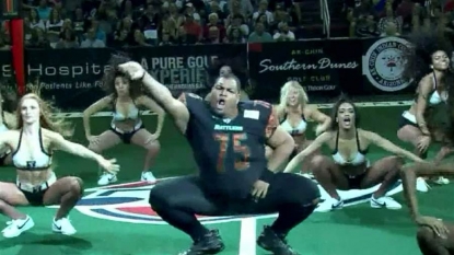 Lineman-Sized Dancer Boogies Down at Arena Football Game