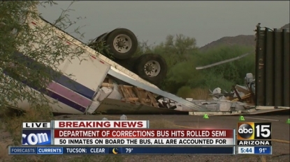 Bus Carrying 50 Inmates Hits Overturned 18-Wheeler