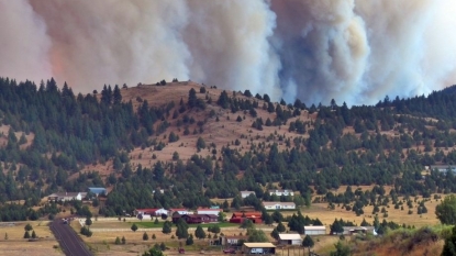 Western wildfires: Wind, heat fueling large blazes chasing people from homes