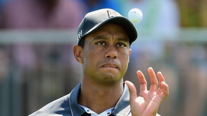 Woods claims share of lead at Wyndham after shooting 65