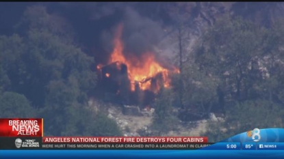 100-acre brushfire burns cabin, prompts evacuations in forest near Los Angeles