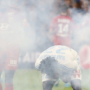 Marseille rally to earn draw with Lyon in temporarily suspended match