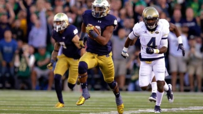 Notre Dame player appeared to hurt his knee badly while celebrating