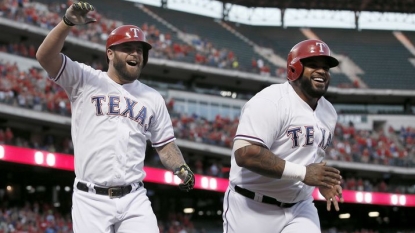 Astros slip back in AL West after 14-3 loss to Rangers