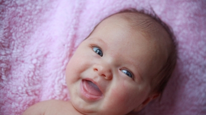 There’s more to learn about why babies smile