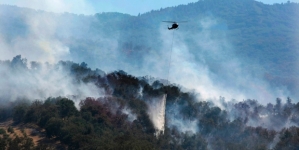 California firefighters battle blazes as three wildfires combine