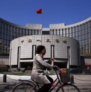 China’s yuan firms on stronger midpoint, Fed decision to hold rates