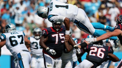 Cam Newton surprises 10-year-old cancer patient at Halloween party