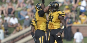 No. 22 Missouri has tough time holding off Connecticut 9