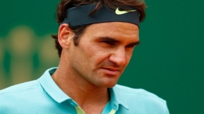 Federer win in singles lifts Swiss to Davis Cup playoff win