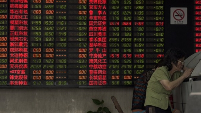 HK, Shanghai shares fall on weak data