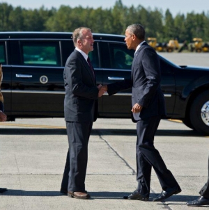 In climate bid, Obama stares down melting Alaska glacier