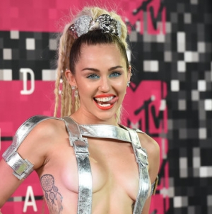 Listen to Miley Cyrus’ Powerful New Song ‘Hands of Love’!