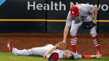 Louis Cardinals’ Stephen Piscotty carted off field after collision