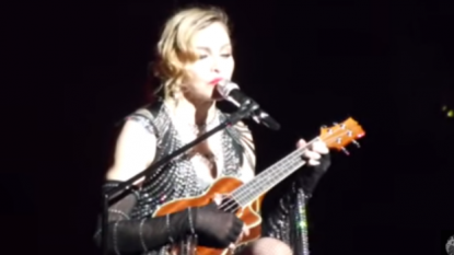 Madonna praises “open-minded” new Pope at Philadelphia show