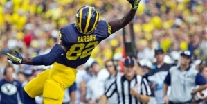 Michigan’s Smith hurts ankle, says he’ll play next week