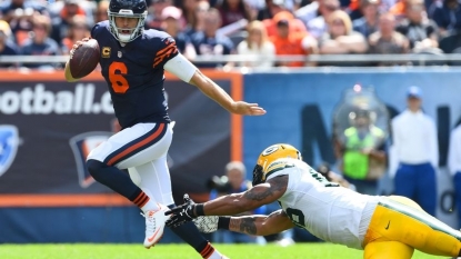 NFC North: Rodgers’ three TDs lift Packers over Bears