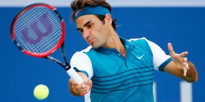 Federer downs Kohlschreiber to make fourth round