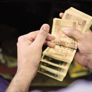 Rupee opens at two-week high, rises 31 paise to 66.15/USD