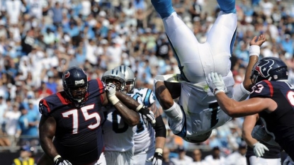 Cam Newton defies gravity, logic and sense to score somersault touchdown