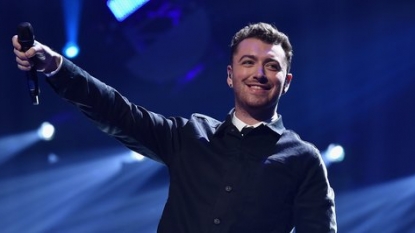 Sam Smith Debuts 15-Second Snippet Of Bond Tune ‘Writing’s On The Wall’