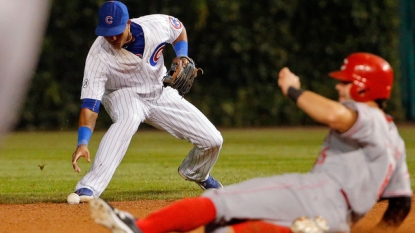 Schwarber hits 2-run HR to power Cubs past Reds 5-4