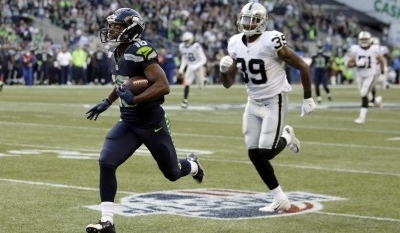 Seahawks’ Tyler Lockett scores on 63-yard touchdown reception