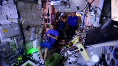 Space station astronauts are first to view new Martian movie