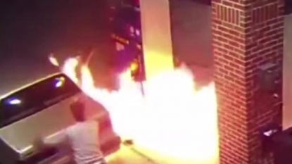 Motorist sets lighter to spider at gas station, burns pump