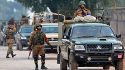 Taliban militants kill at least 20 at Pakistani military base, mosque