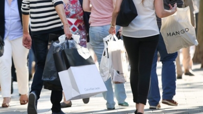 U.S. consumer spending rises; core inflation firms slightly