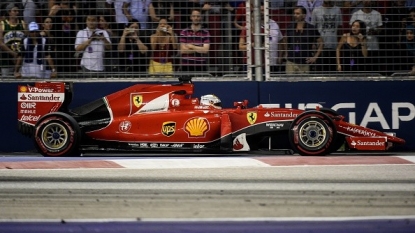 Vettel takes Singapore pole