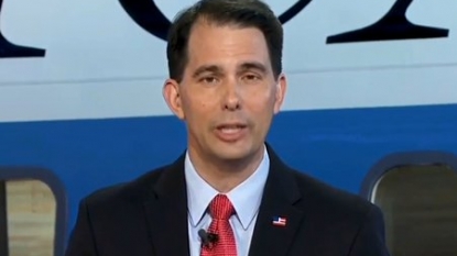 Walker to focus on Iowa following quiet debate