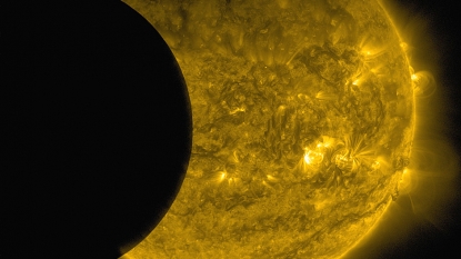 Watch the Earth and Moon Photobomb the Sun Within Moments of Eachother